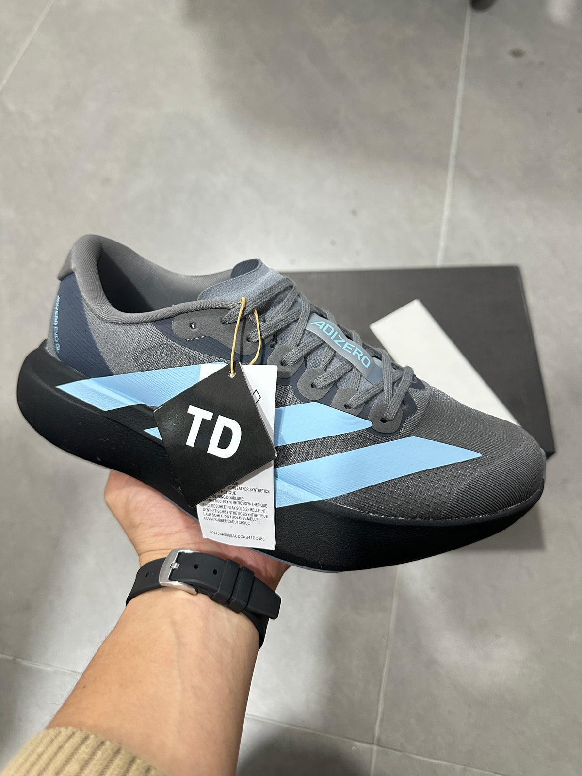 Grey and Blue Adizero Lightstrike Pro Running Shoes - product image from the listing.
