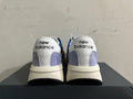 New Balance U370 Sneakers in Blue and Yellow - product image from the listing.