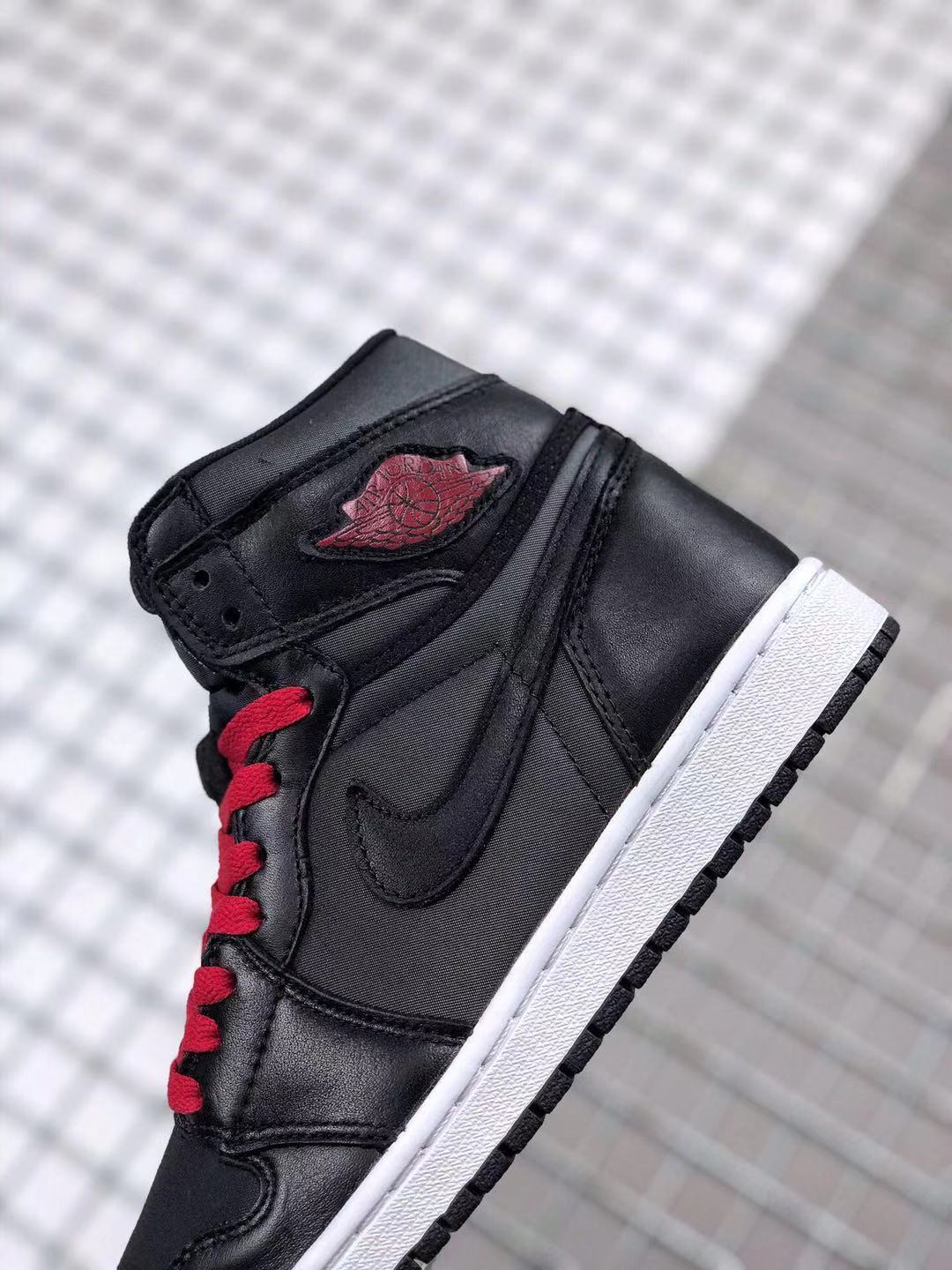 Air Jordan 1 High OG Black Satin Sneakers in Black Red - product image from the listing.