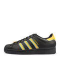 Men's Adidas Superstar - Black/Yellow - product image from the listing.