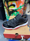 Bred - Jordan 11 Low - product photo shown in the listing for this item.