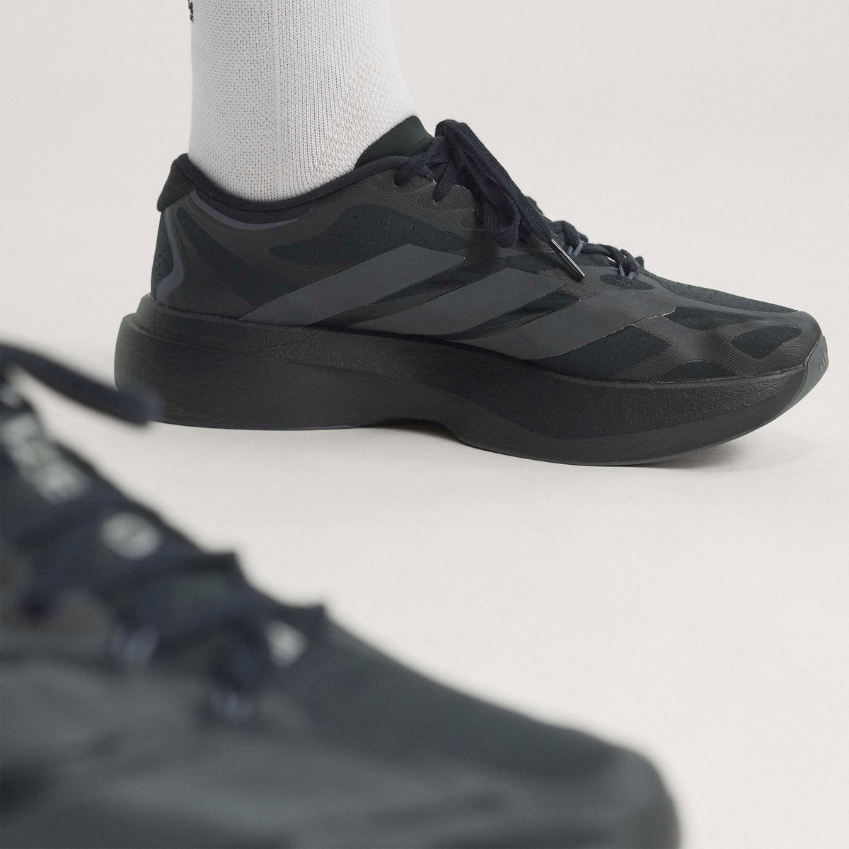 Men's Adidas Adizero Evo SL - Black - product image from the listing.