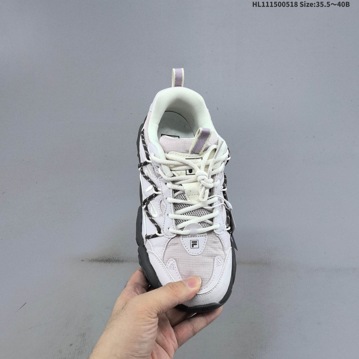 FILA Fluid 6 Low-Cut Sneakers in White and Lilac - product image from the listing.