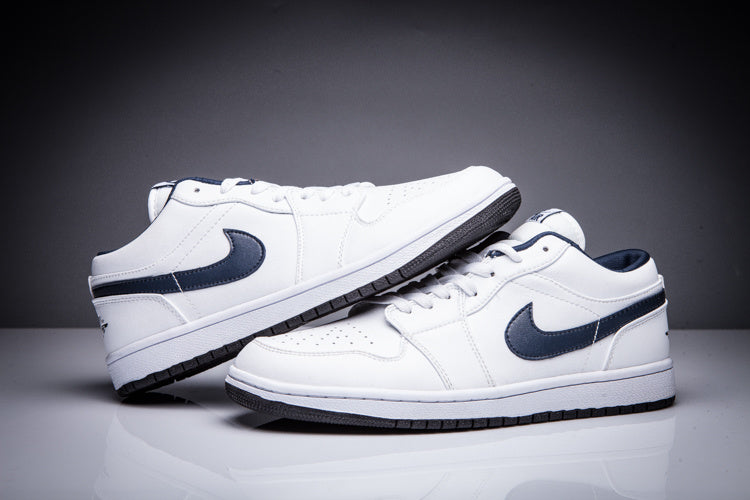 Air Jordan 1 Low White and Black Sneakers - product image from the listing.