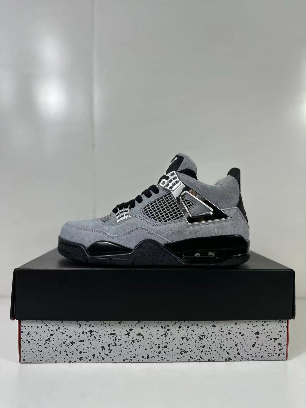 Air Jordan 4 Retro Gray Black Sneakers AQ9129-005 - product image from the listing.
