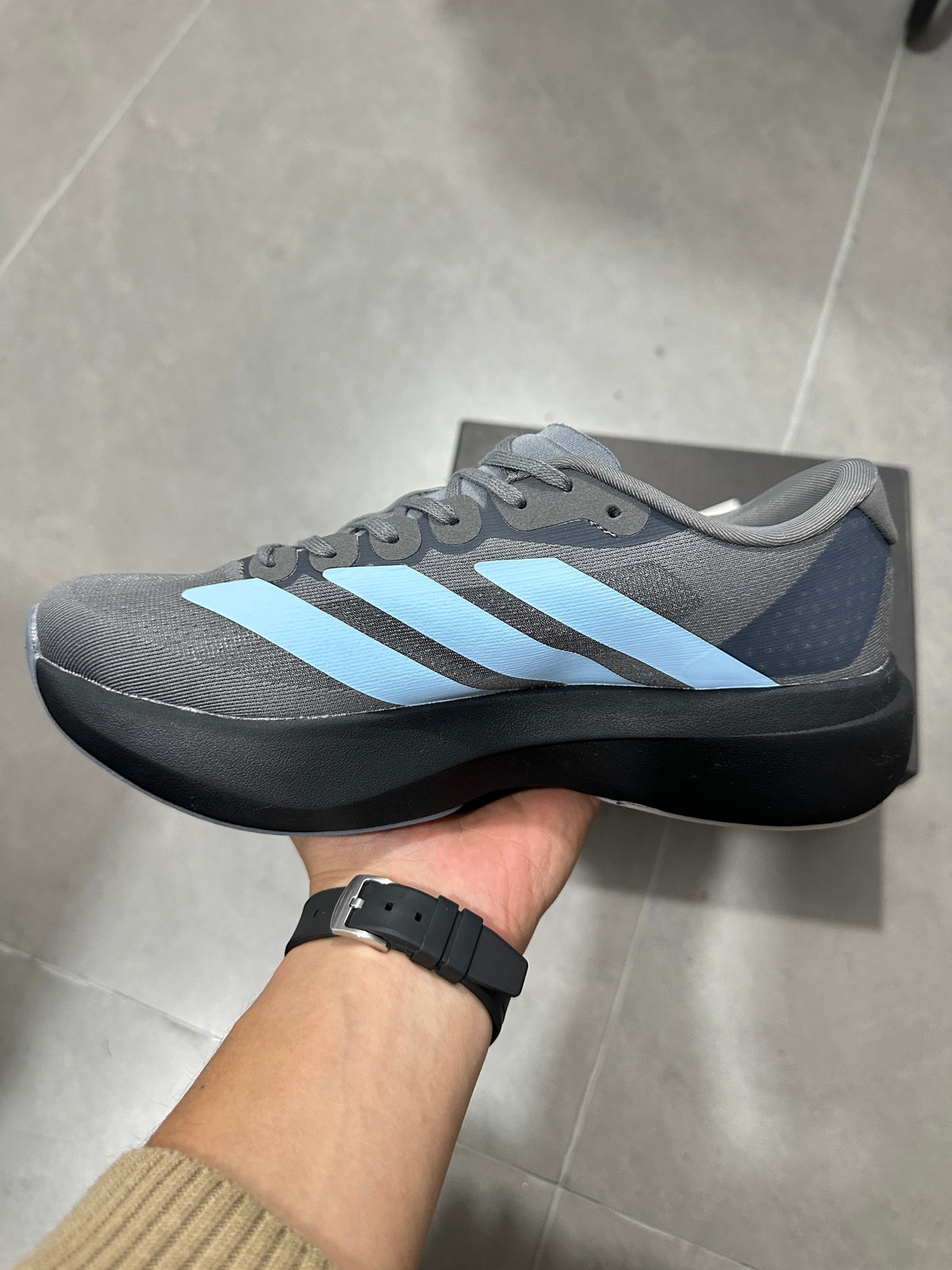 Grey and Blue Adizero Lightstrike Pro Running Shoes - product image from the listing.