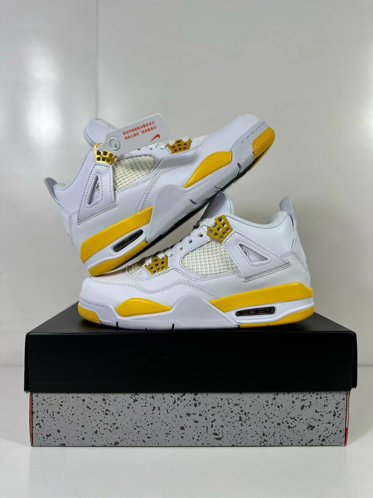 Air Jordan 4 White Yellow Sneakers AQ9129-102 - product image from the listing.