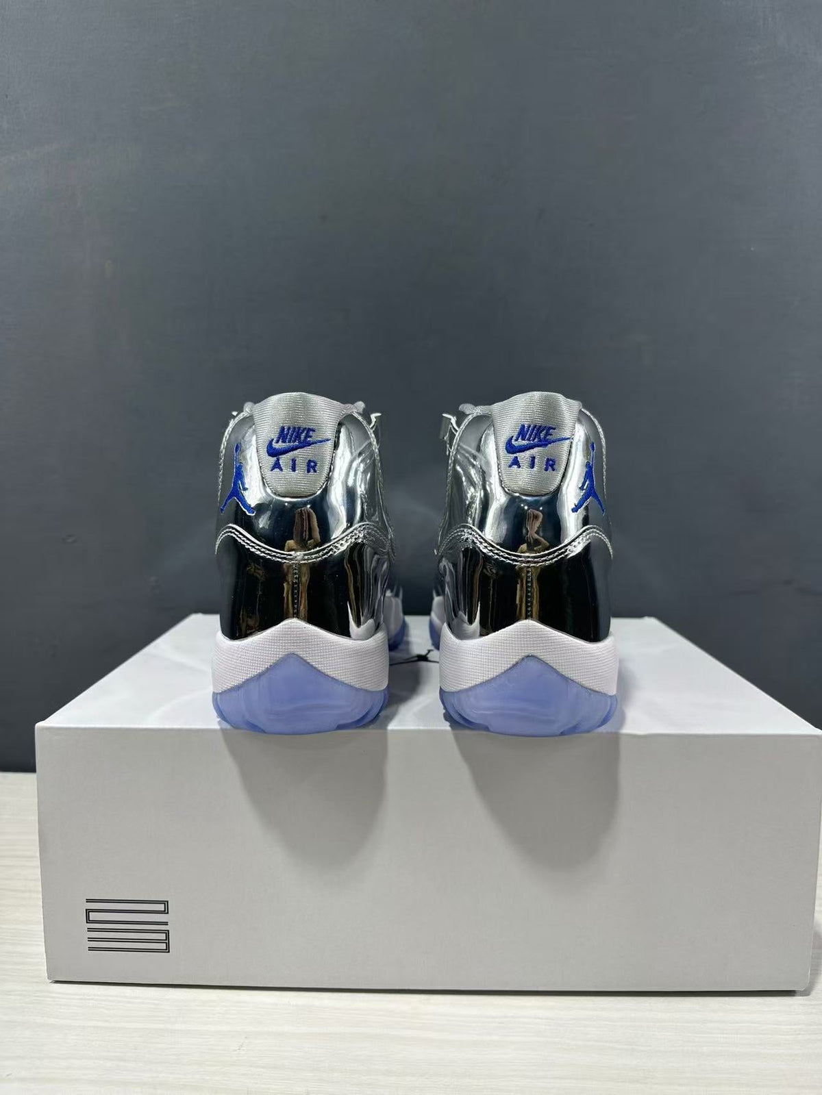 Air Jordan 11 Retro Silver High-Top Sneakers CT8012-730 - product image from the listing.