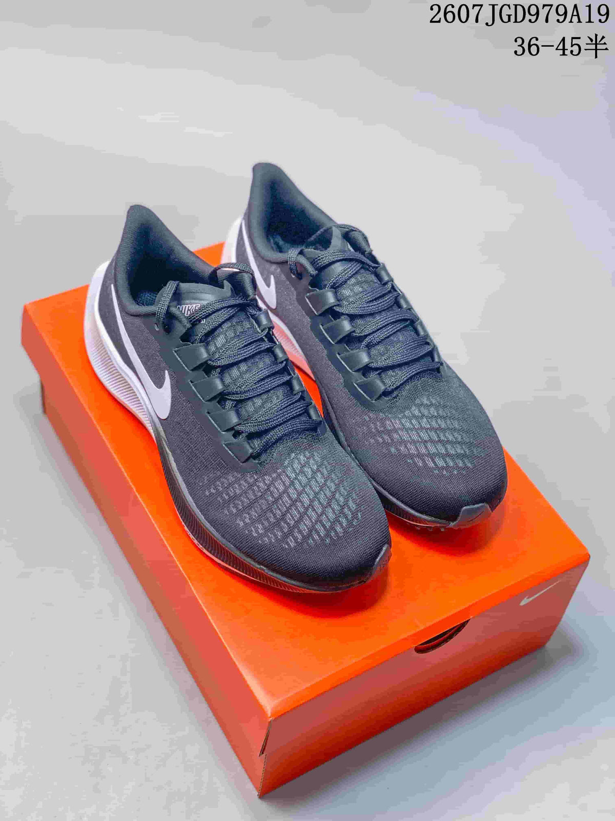 Nike Pegasus 37 Running Sneakers in Black and White - product image from the listing.