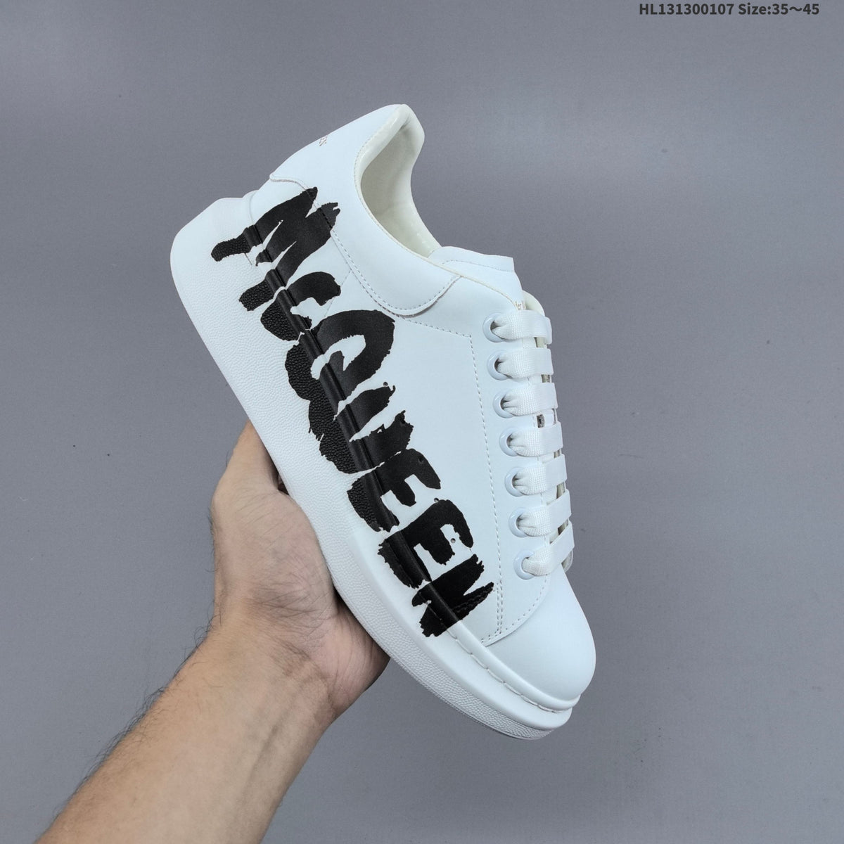 Alexander McQueen Oversized Sole Trainers with Graphic Logo - product image from the listing.