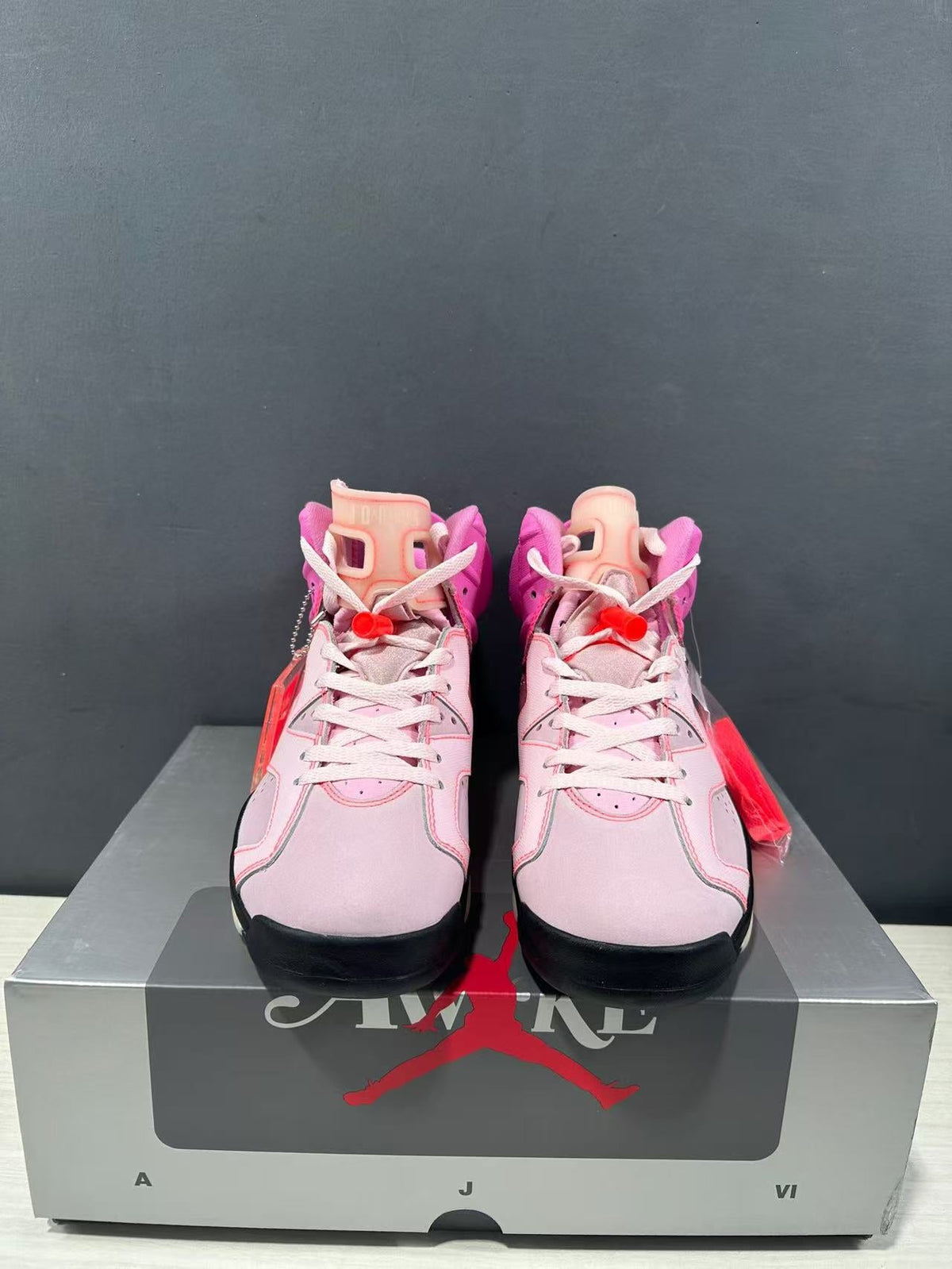 Jordan x Awake NY Air Jordan 6 Retro SP Sneakers in Pink IQ5706-600 - product image from the listing.