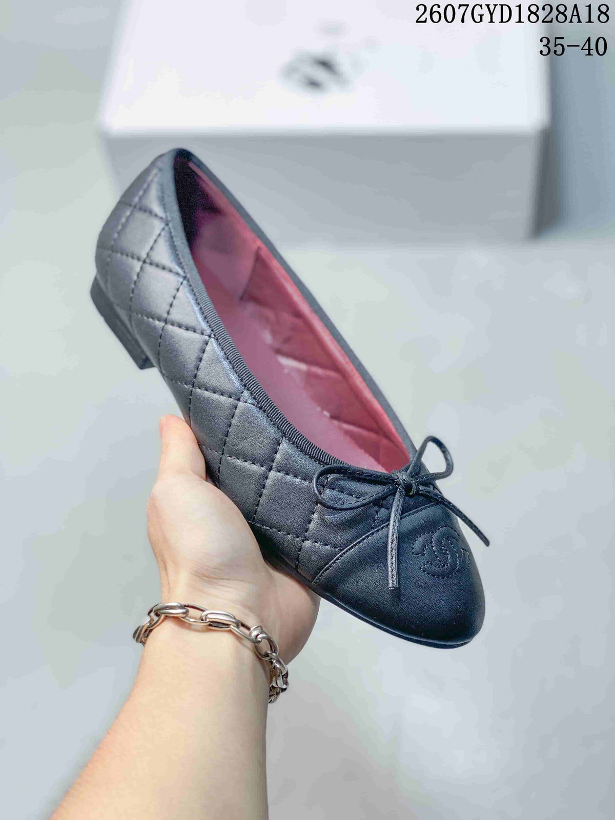 Chanel 26P Washed Denim Ballet Flats in Black and Blue - product image from the listing.