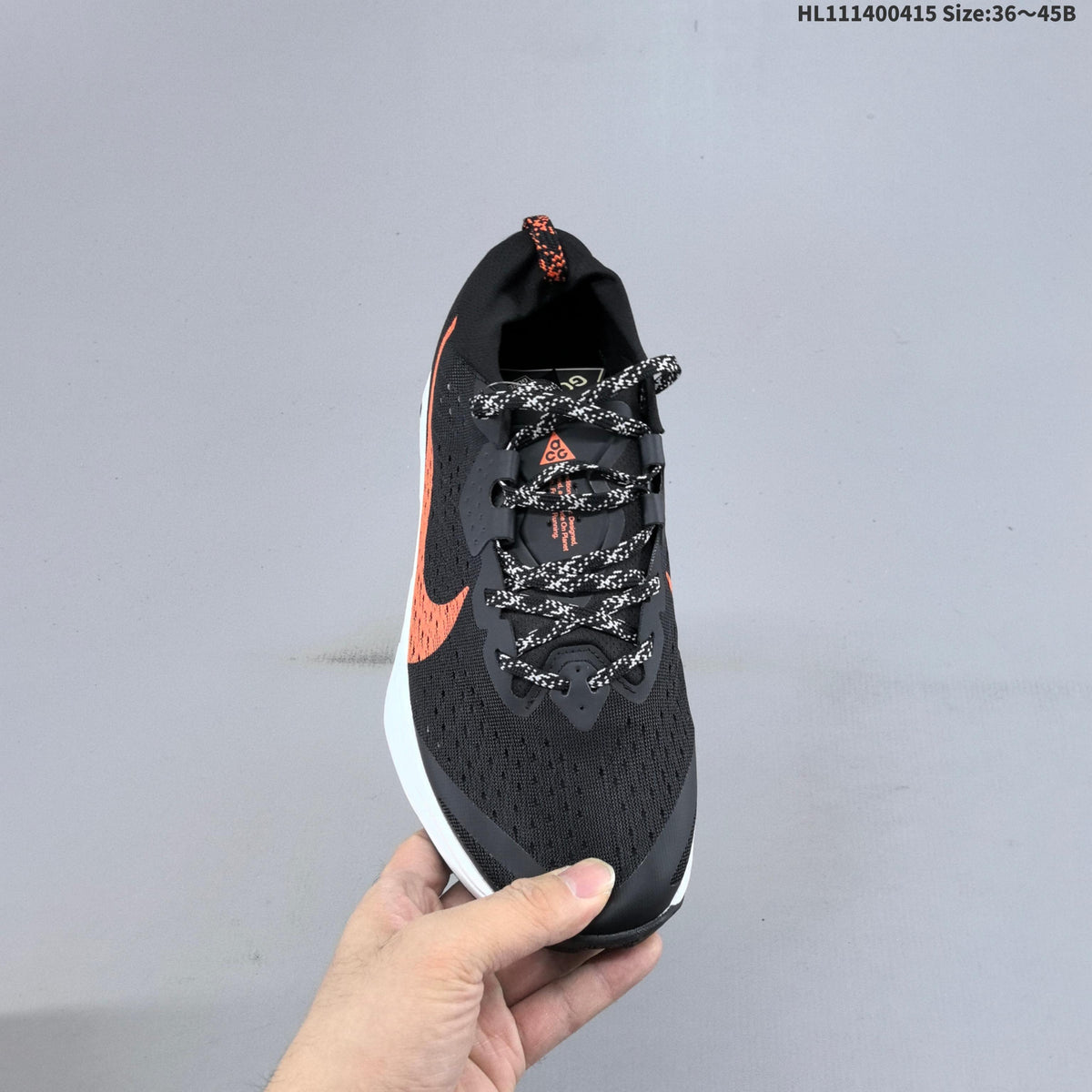 Nike ACG Zegama Trail Running Shoes, in Black and Orange - product image from the listing.