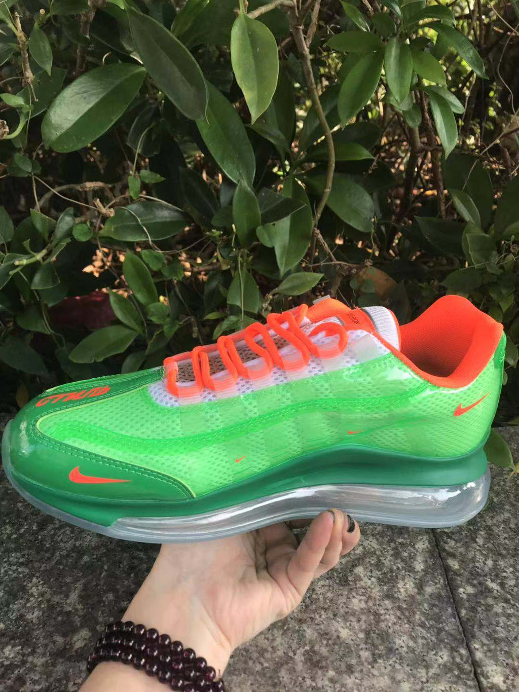 Nike Air Max 720 Sneakers in Green and Orange - product image from the listing.