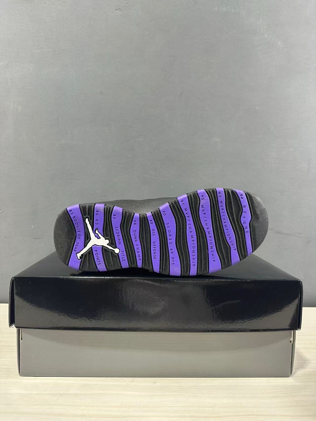 Air Jordan 10 High-Top Sneakers Black Purple 130209-051 - product image from the listing.