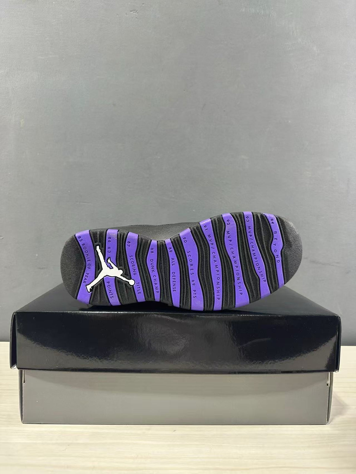 Air Jordan 10 High-Top Sneakers Black Purple 130209-051 - product image from the listing.