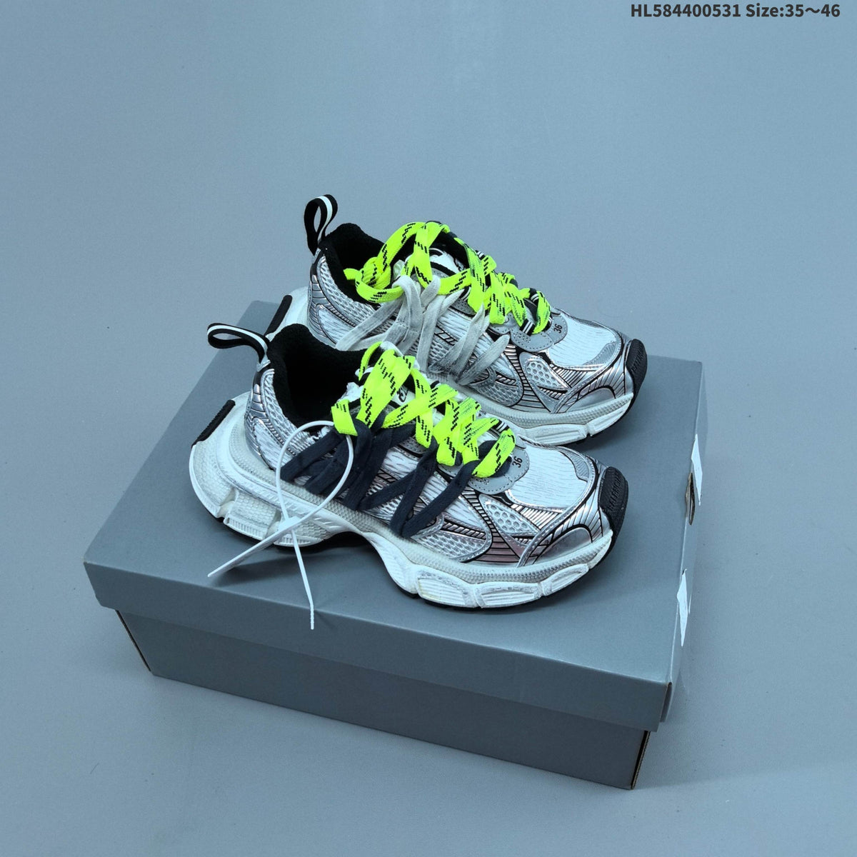 Silver and Grey Balenciaga 3XL Low-Top Sneakers - product image from the listing.