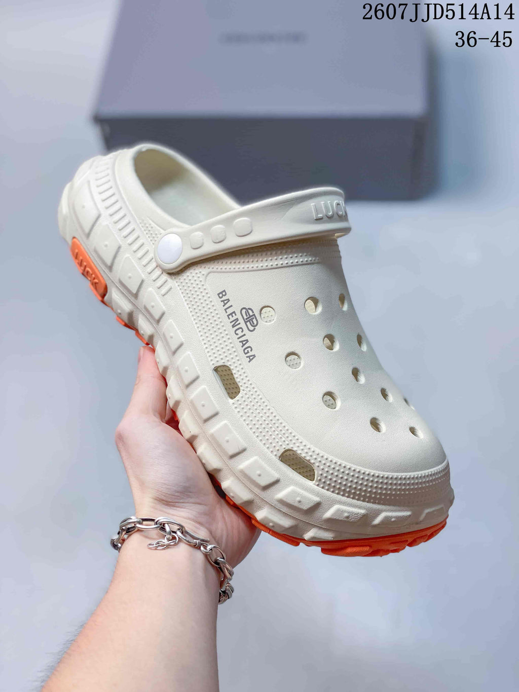 Balenciaga Tire Clog Sandals Off-White in Orange 2607JJD514A14 - product image from the listing.