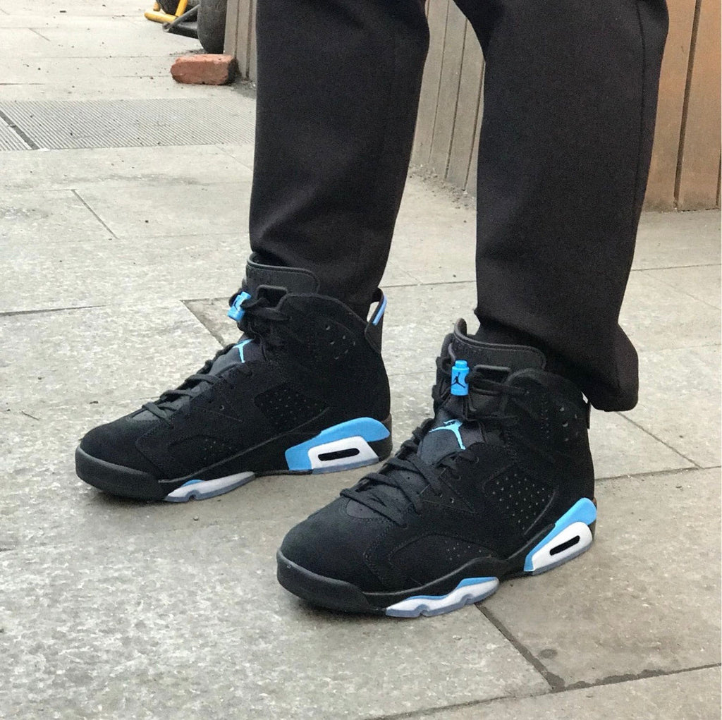 Air Jordan 6 UNC Black and University Blue Sneakers - product image from the listing.