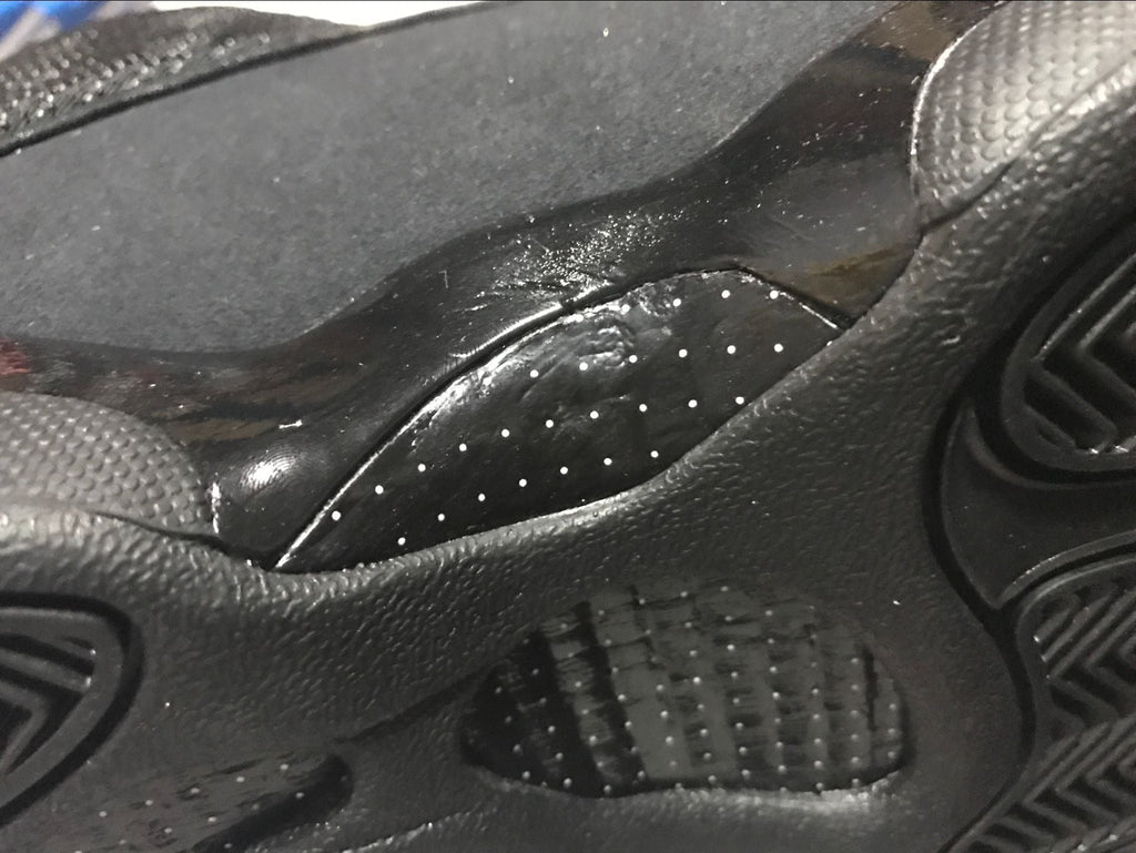 Air Jordan 13 Retro Black Cat Basketball Sneakers in Black - product image from the listing.