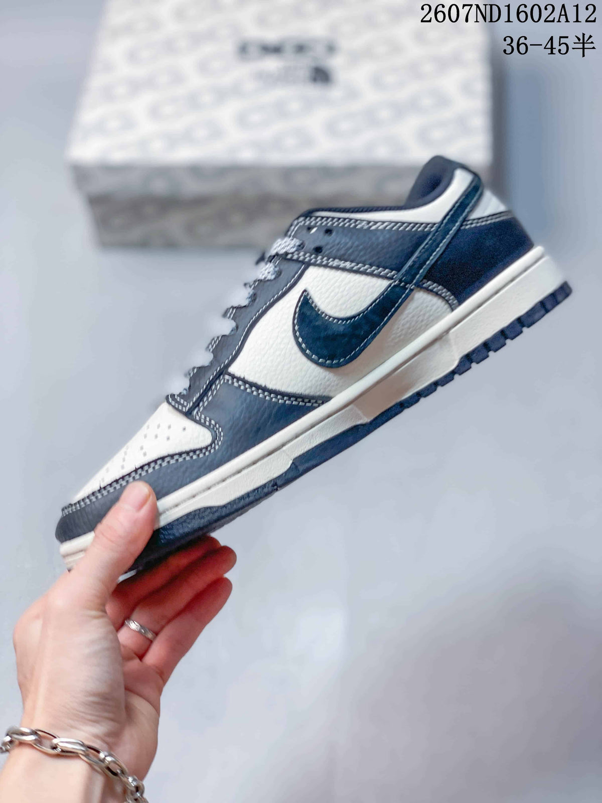 Nike SB Dunk Low North Face Color-Block Trainers - product image from the listing.