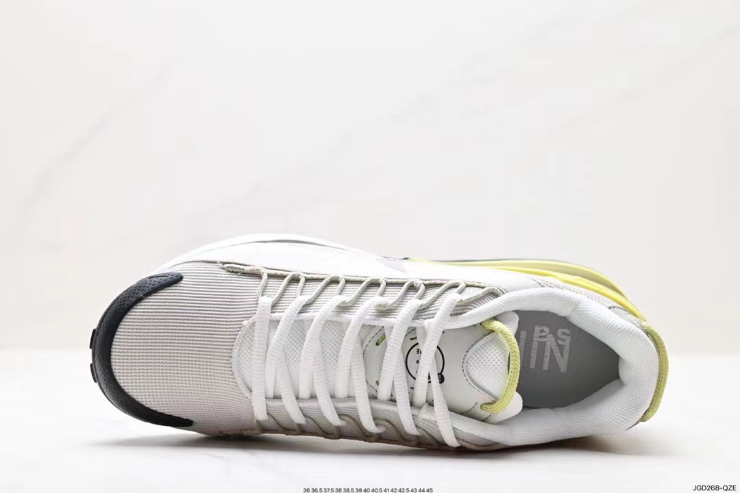 White and Volt Nike Air Max 95 Sneakers - product image from the listing.