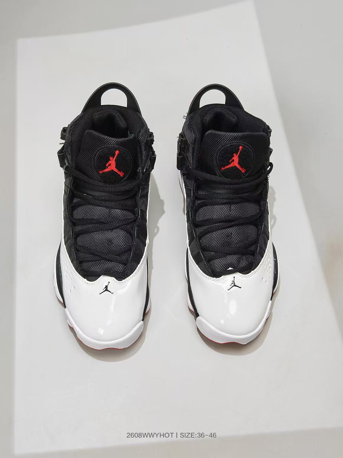 Jordan 6-12 Sneakers in Black White Red - product image from the listing.