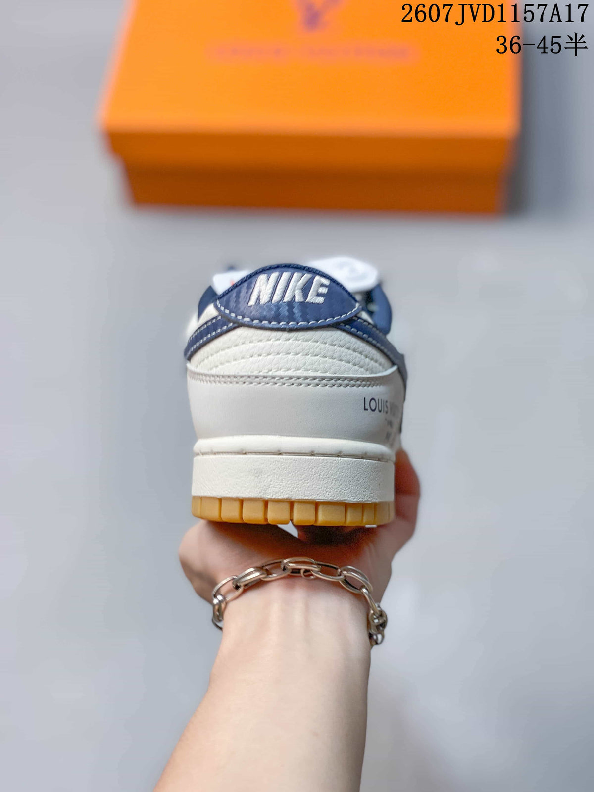 Louis Vuitton x Nike Dunk Low Sneakers in White Navy - product image from the listing.