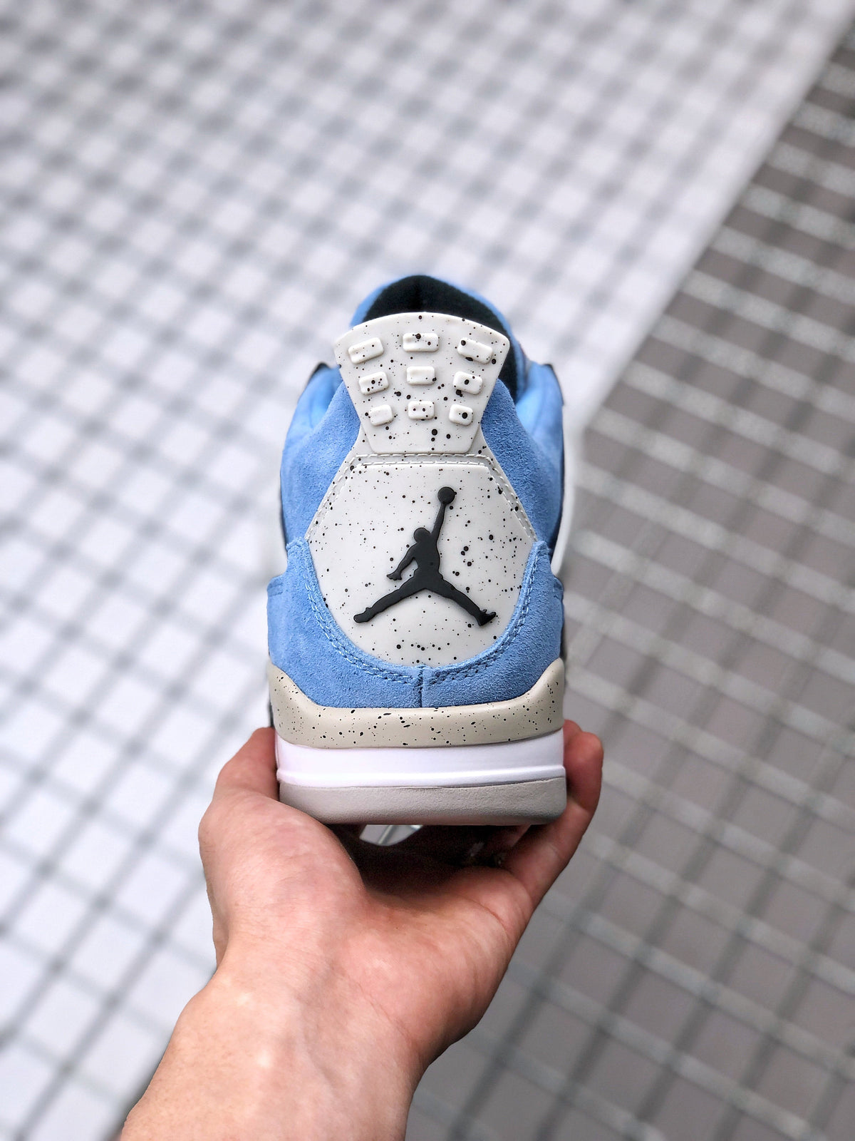 Air Jordan 4 University Blue Sneakers CT8527-400 - product image from the listing.