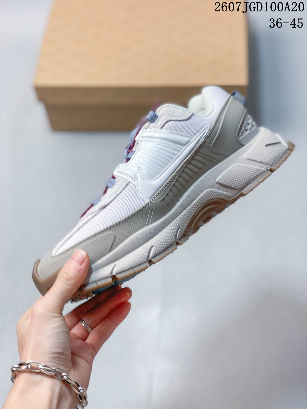 Nike Zoom Vomero Roam Sneakers in White Grey 2607TGD100A20 - product image from the listing.