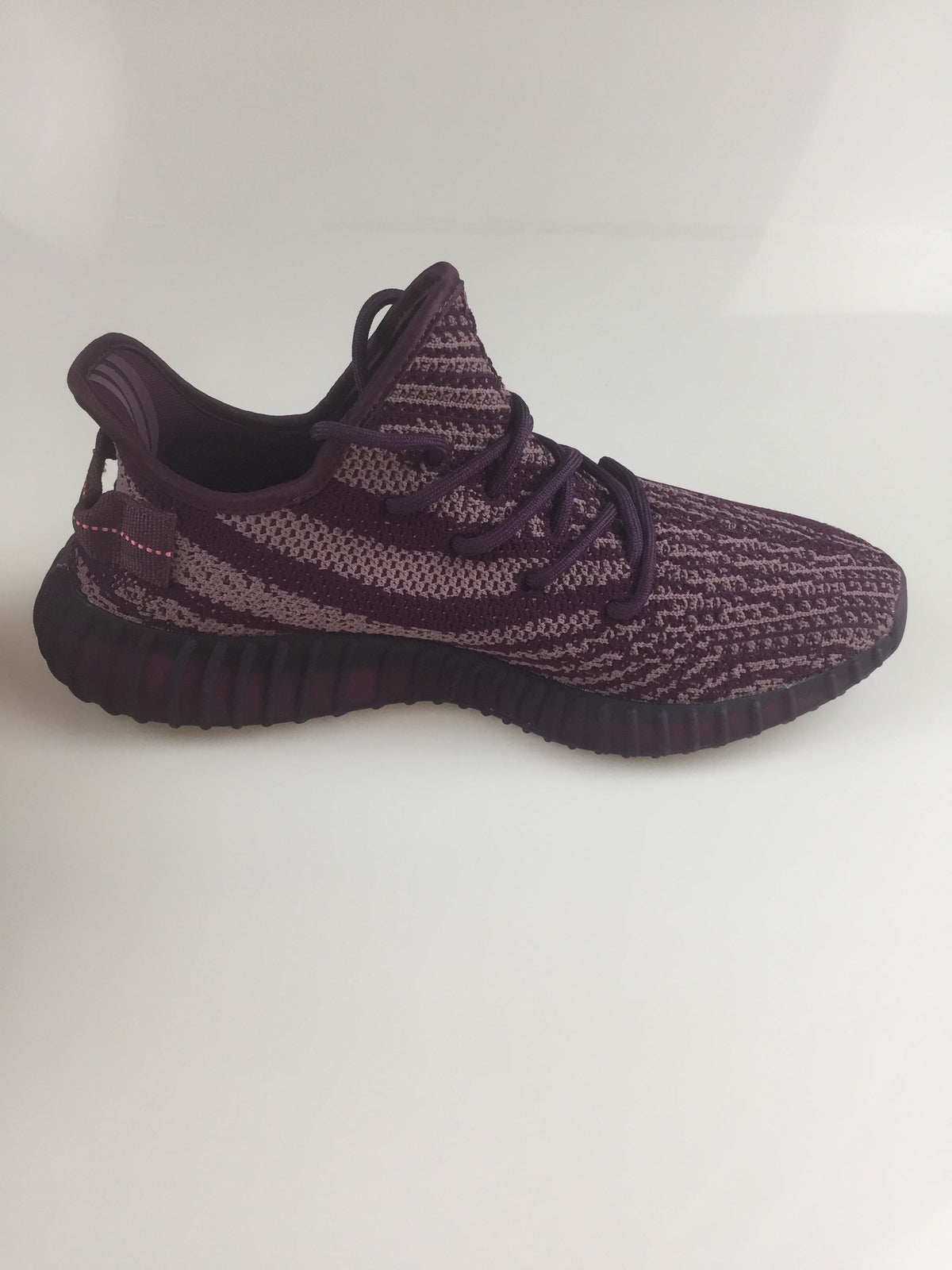 Black and Beige Yeezy 350 V2 Knit Sneakers - product image from the listing.