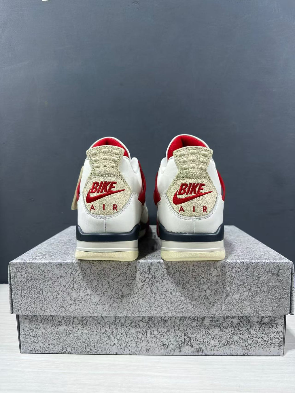 Air Jordan 4 Retro White Red Sneakers - product image from the listing.