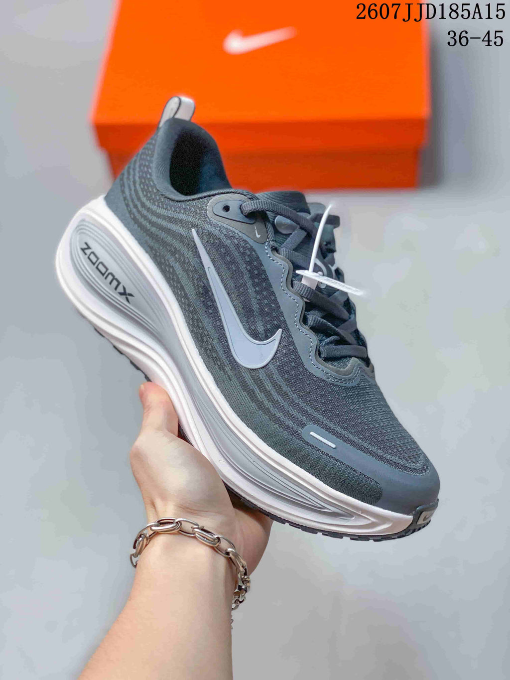 Nike Vomero Plus Run Sneakers in Dark Gray White 2607JJD185A15 - product image from the listing.