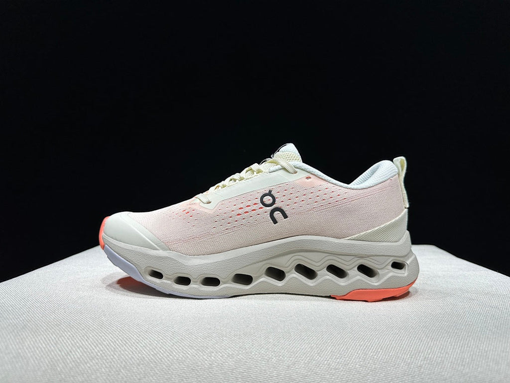 On Cloudsurfer Trail 2 Trail Running Shoes, in Ivory and Coral - product image from the listing.