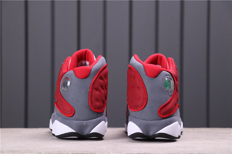 Air Jordan 13 Red Flint Sneakers 414571-600 - product image from the listing.