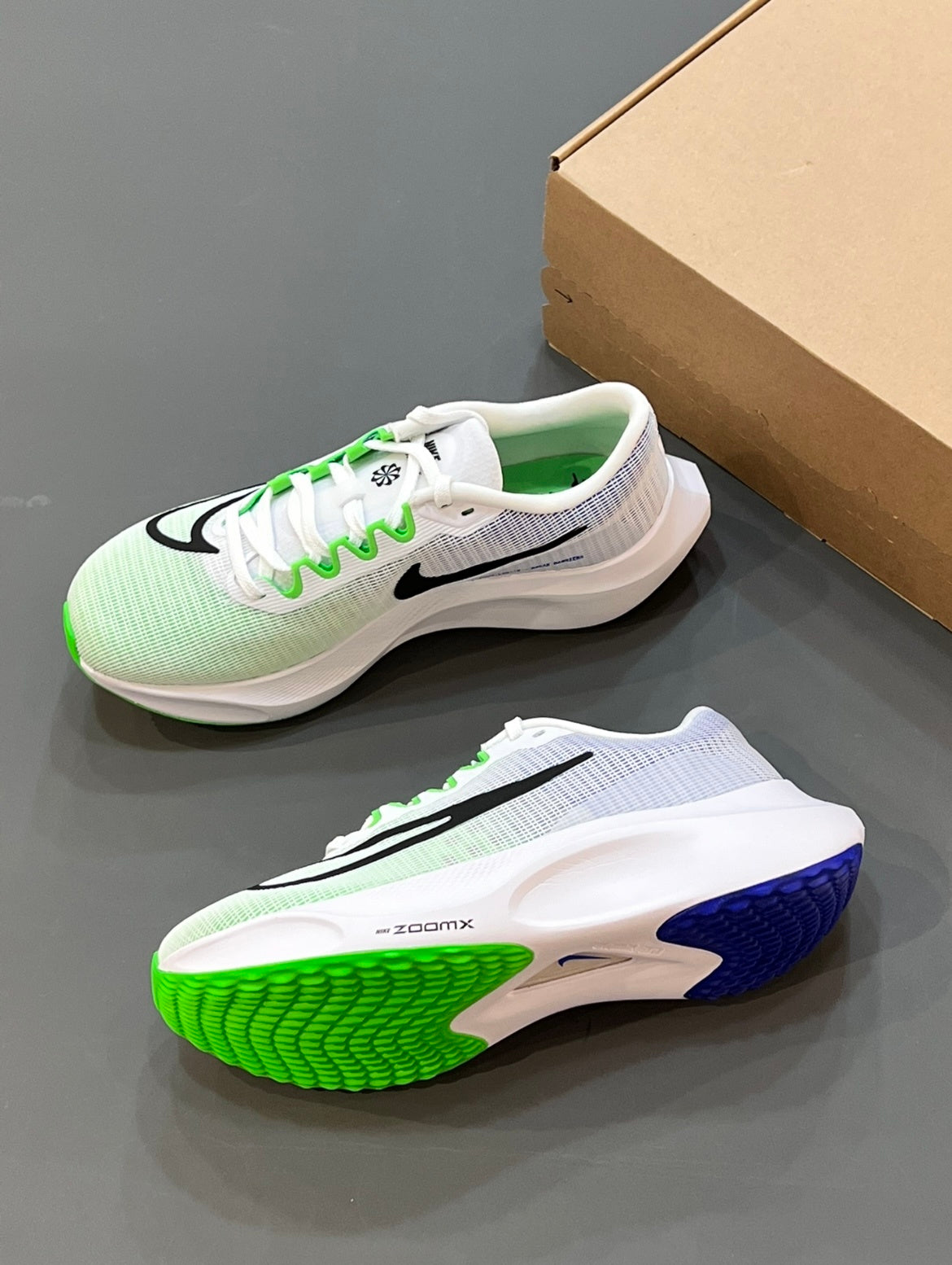 Nike Zoom Fly 5 Running Shoes in White Green Blue DM8968-101 - product image from the listing.
