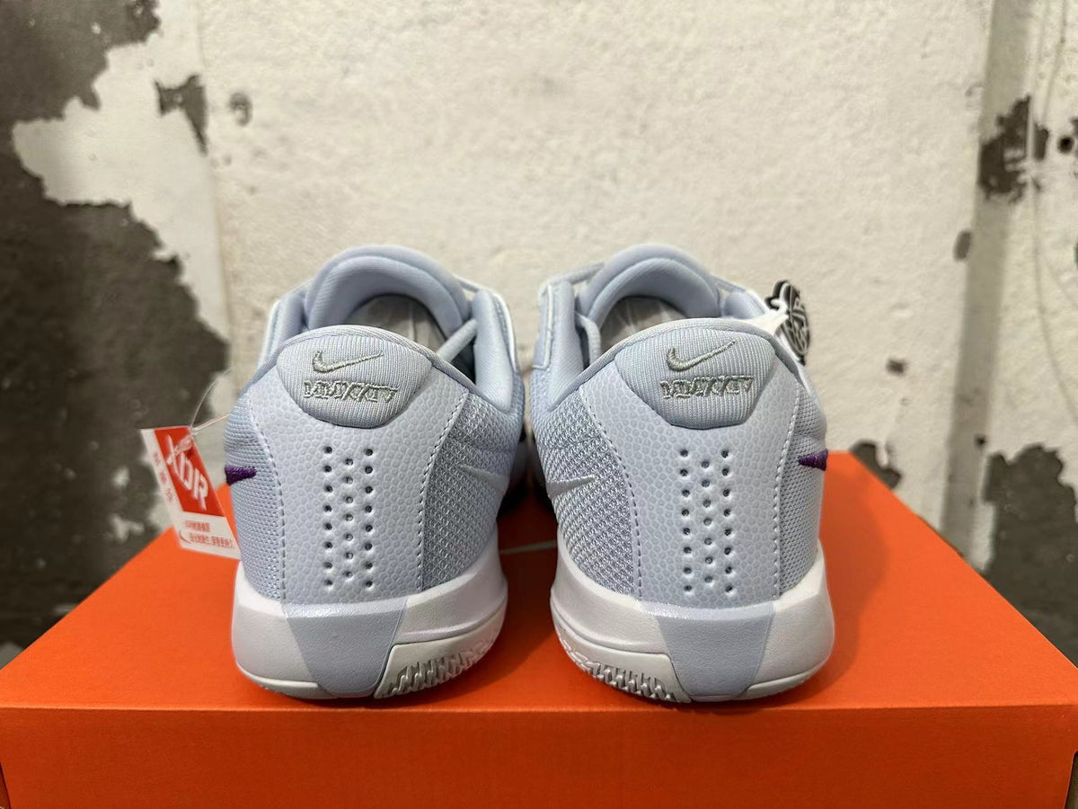Gray and Purple Nike Ja 1 Basketball Shoes - product image from the listing.