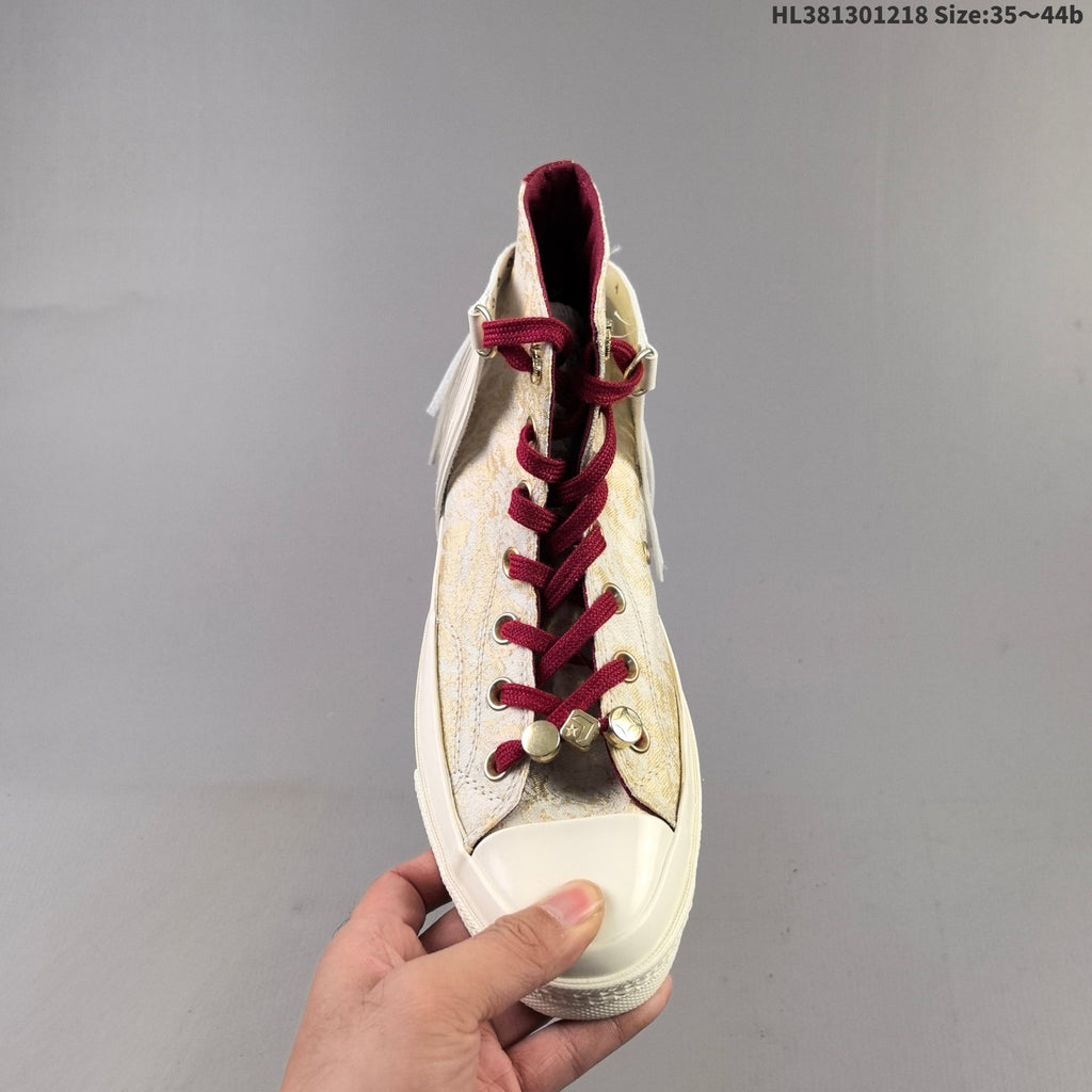 Converse Chuck 70 High-Top Sneakers, in Gold and Burgundy - product image from the listing.