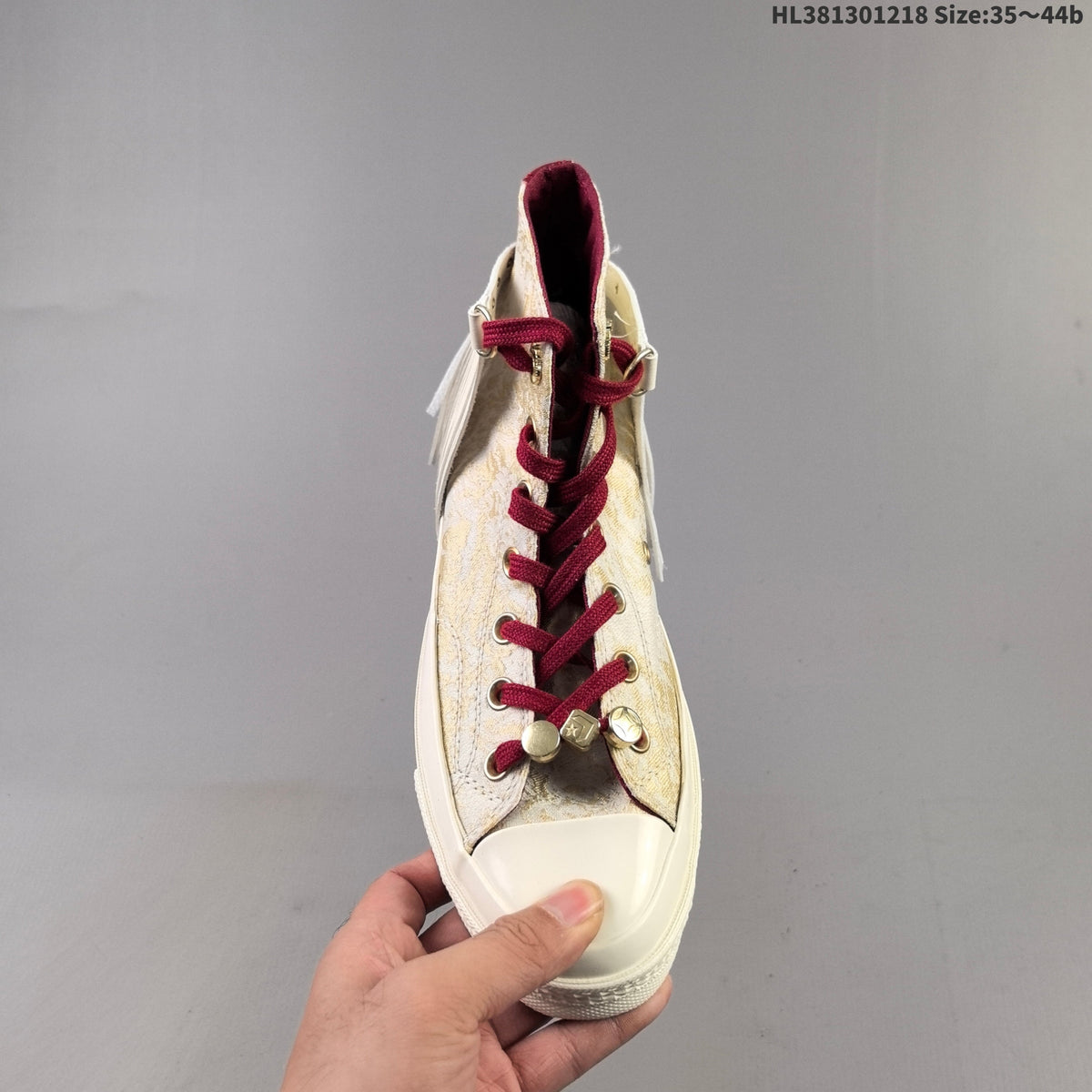 Converse Chuck 70 High-Top Sneakers, in Gold and Burgundy - product image from the listing.