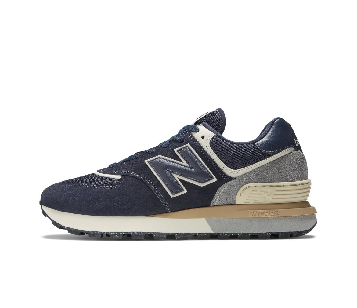 New Balance 574 Sneakers in Navy and Gray - product image from the listing.