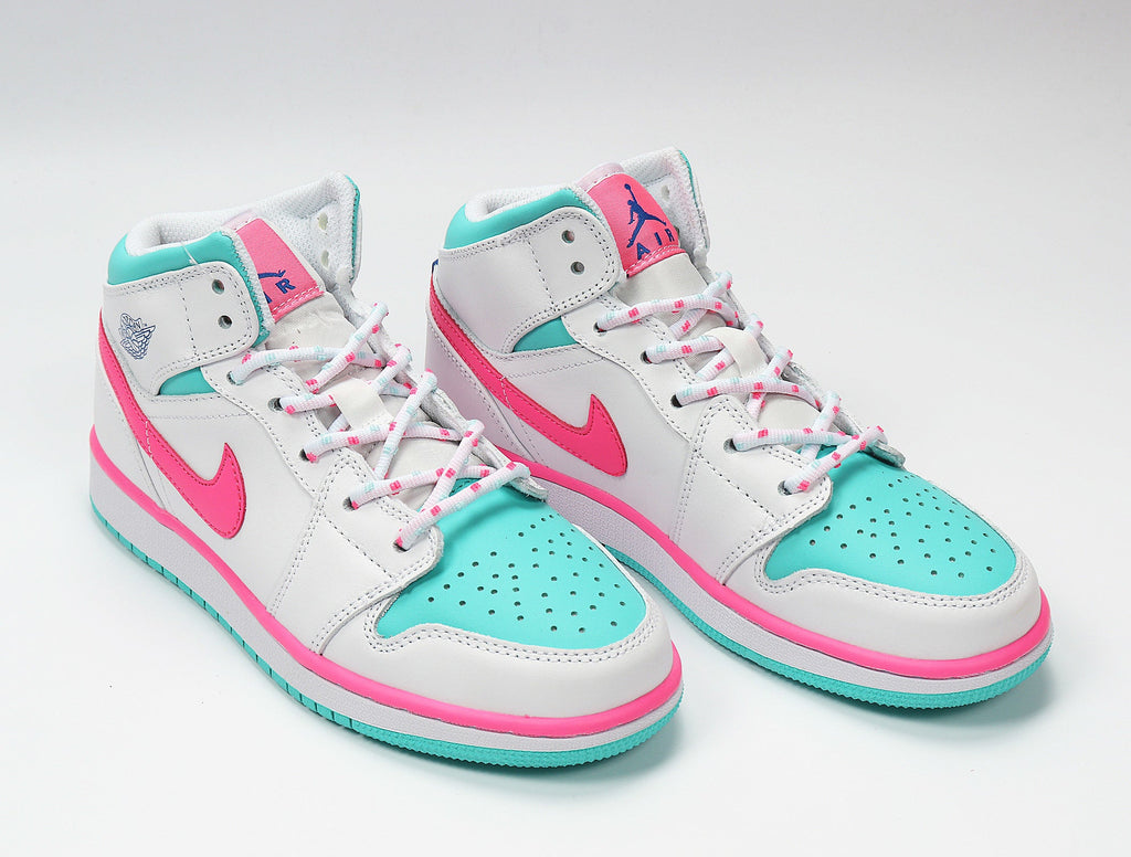 Jordan 1 Mid Sneakers in White Pink Turquoise 555112-102 - product image from the listing.