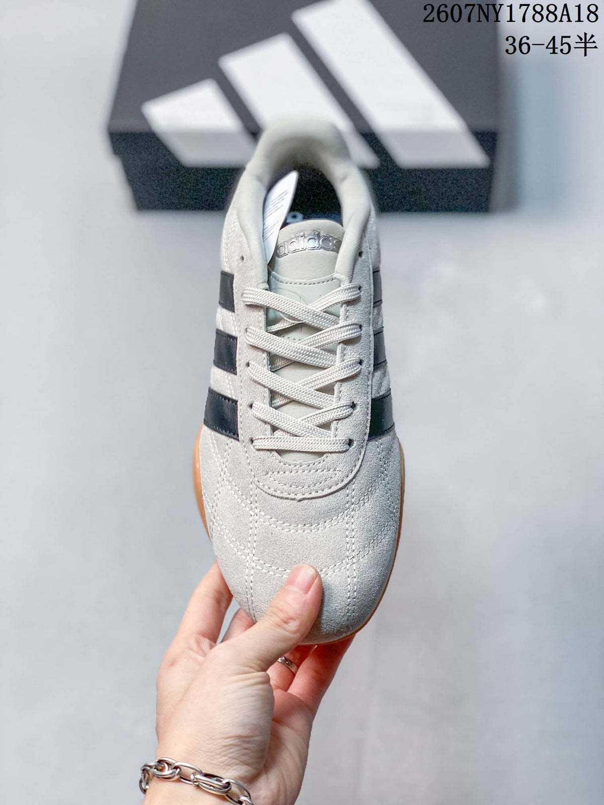 adidas Adipista Trainers in White Navy Gum EG8662 - product image from the listing.