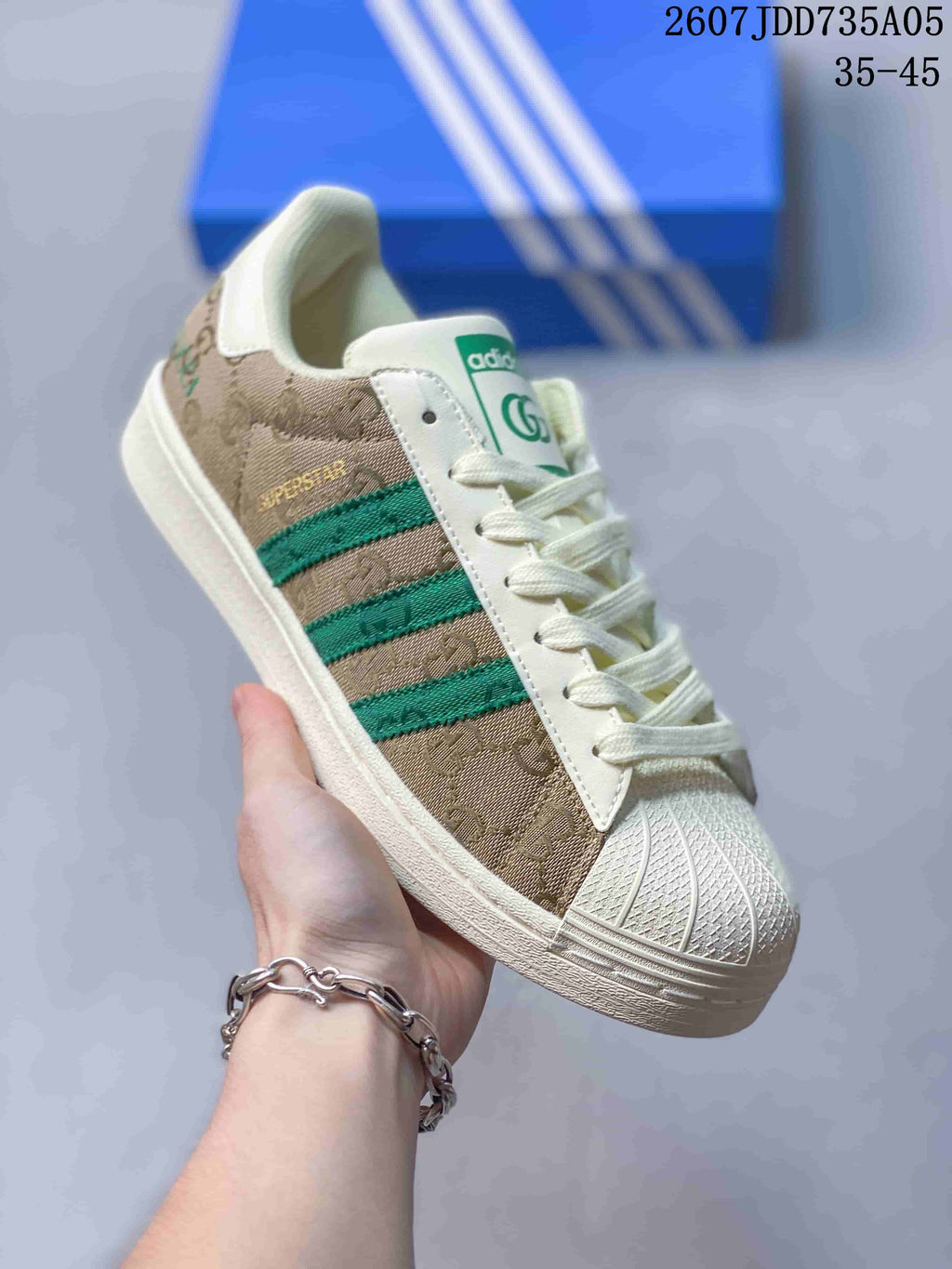 adidas Superstar Trainers Beige Green Shell-Toe Style 2607JDD735A05 - product image from the listing.