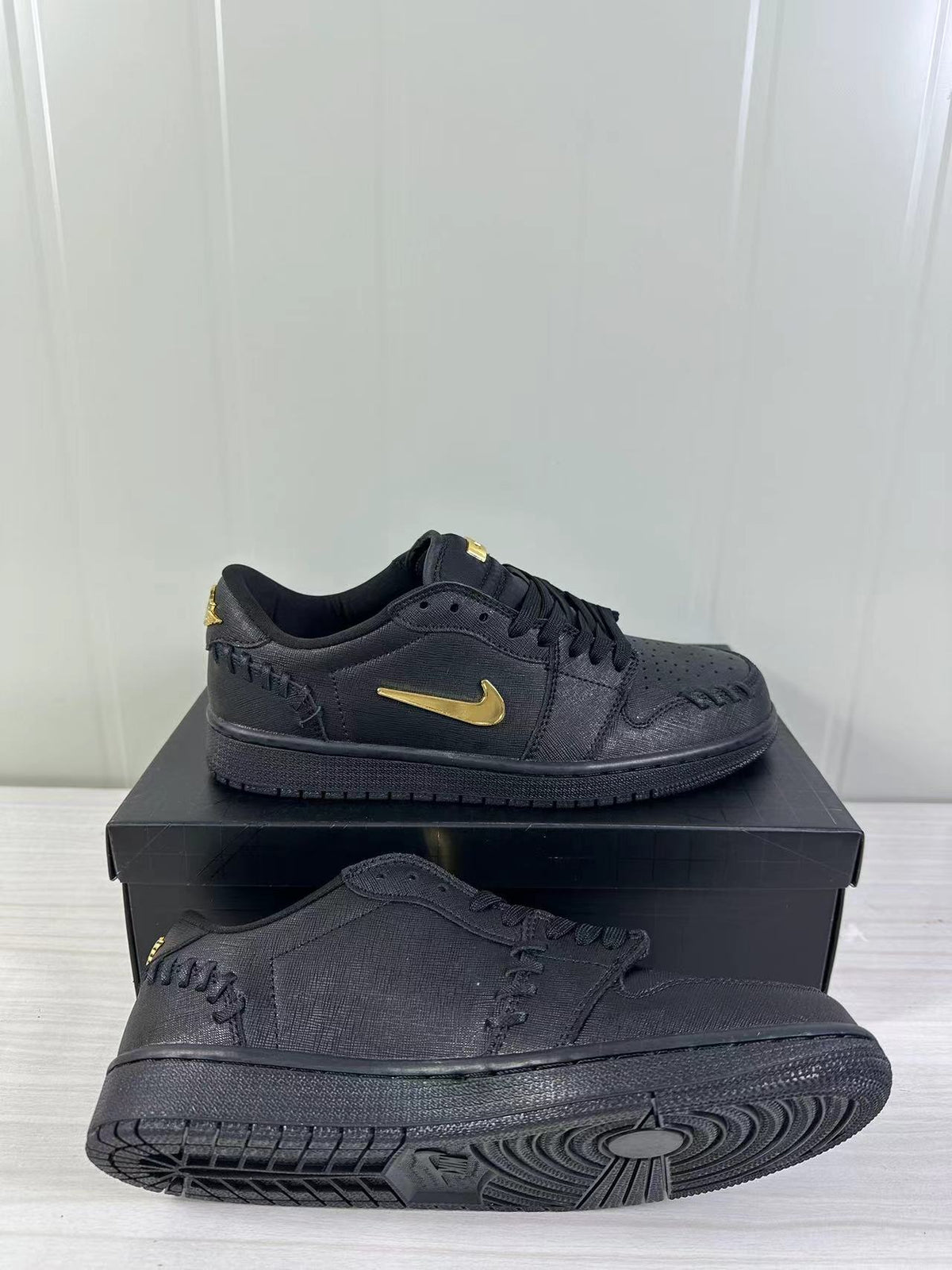 Air Jordan 1 Low Sneakers Black/Gold FN5032-007 - product image from the listing.