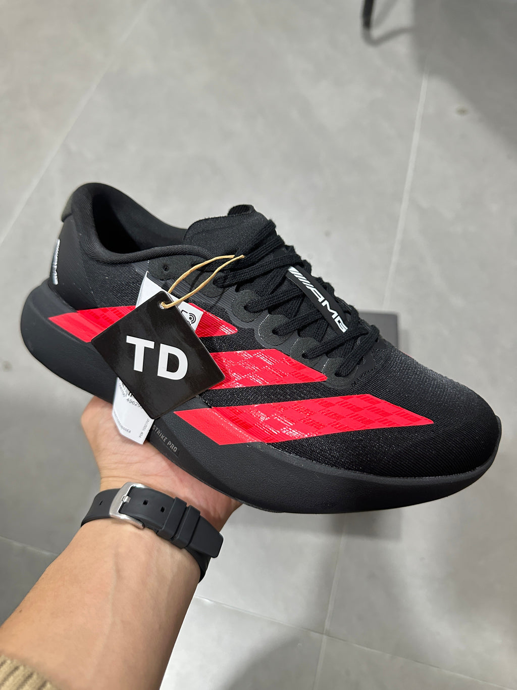 Adidas Lightstrike Pro AMG Running Shoes in Black and Red KH8832 - product image from the listing.