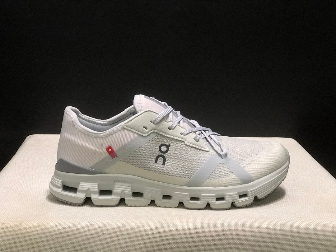 On Cloud X 4 AD Sneakers in Wolf/Alloy in Light Gray - product image from the listing.