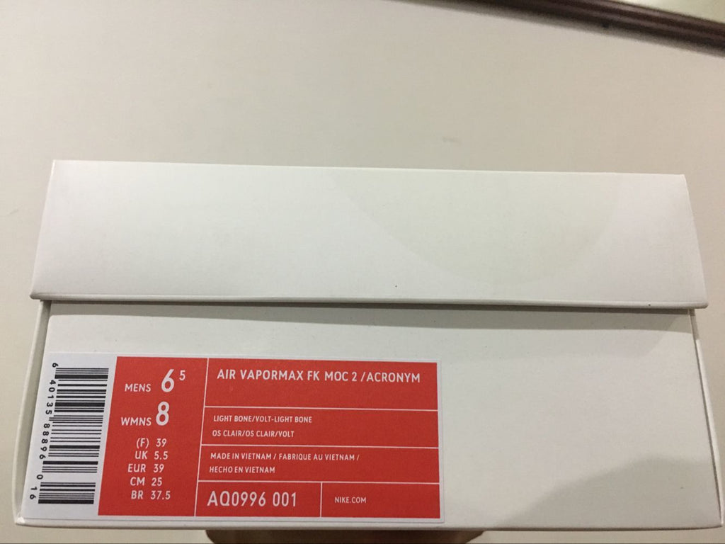 Nike Air VaporMax Moc 2 Acronym in Black White Volt AQ0996-001 - product image from the listing.