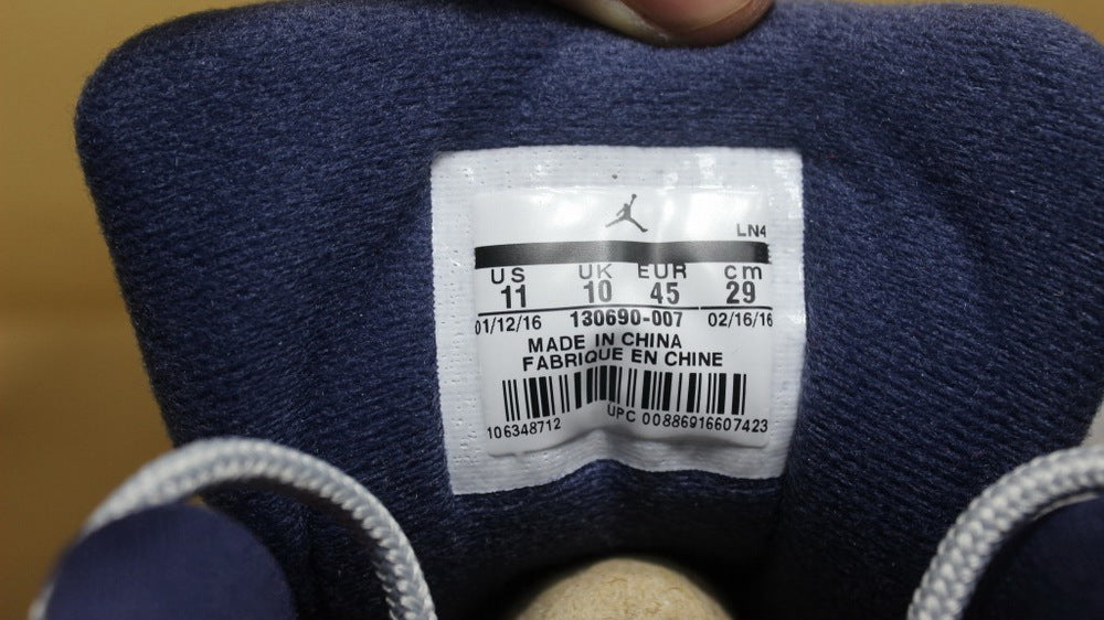 Air Jordan 12 GreyBlue High-Cut Sneakers - product image from the listing.