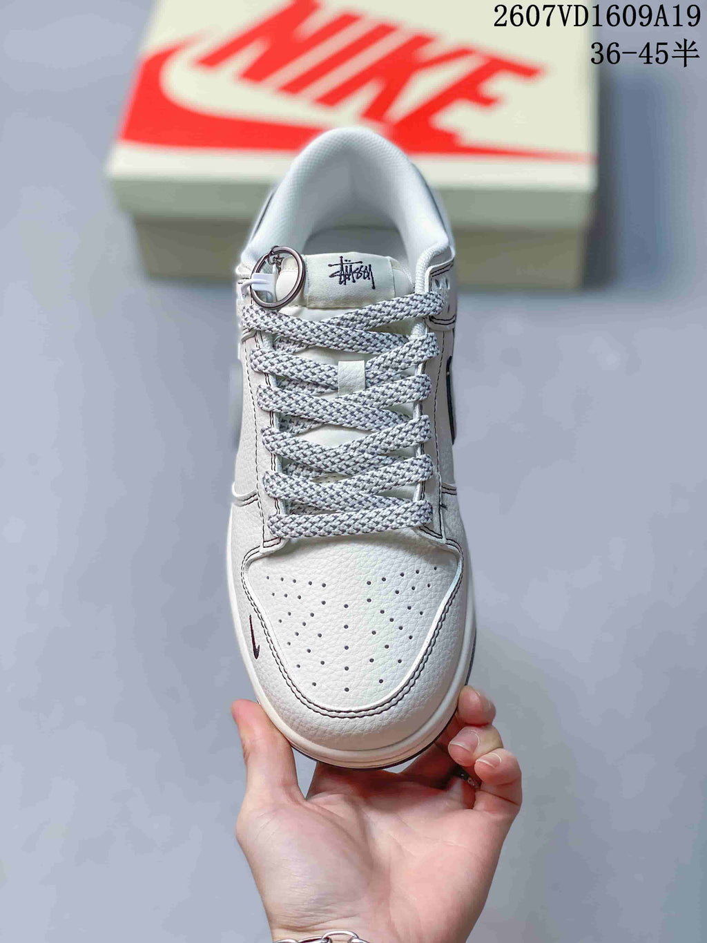 Nike Dunk Low Retro Sneakers in White Navy 2607VD1609A19 - product image from the listing.