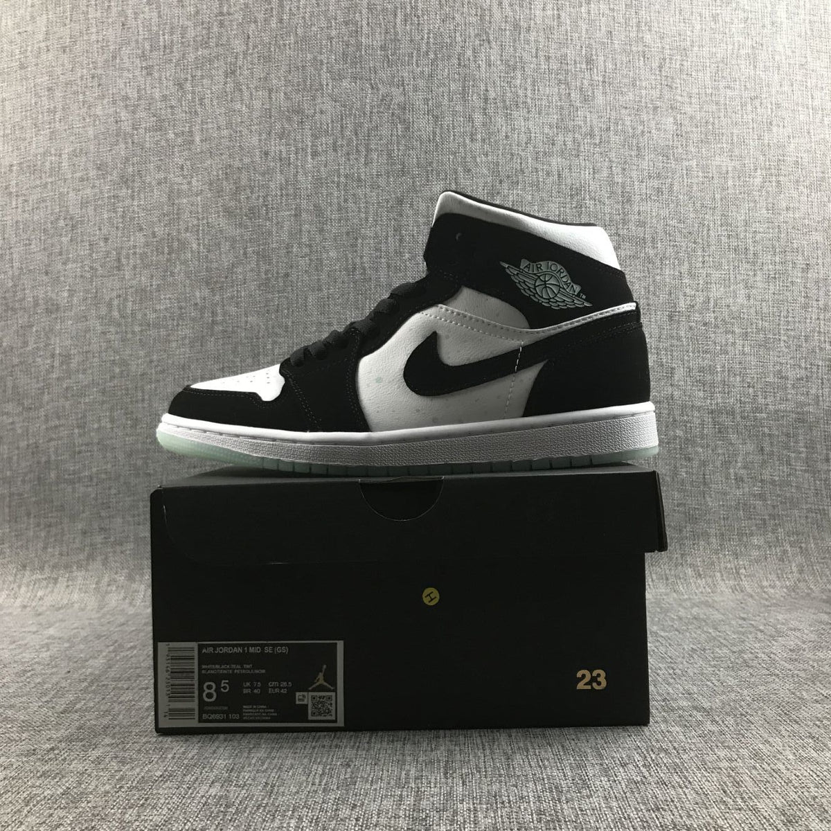Air Jordan 1 Mid Sneakers in Black White Mint BQ6931-103 - product image from the listing.